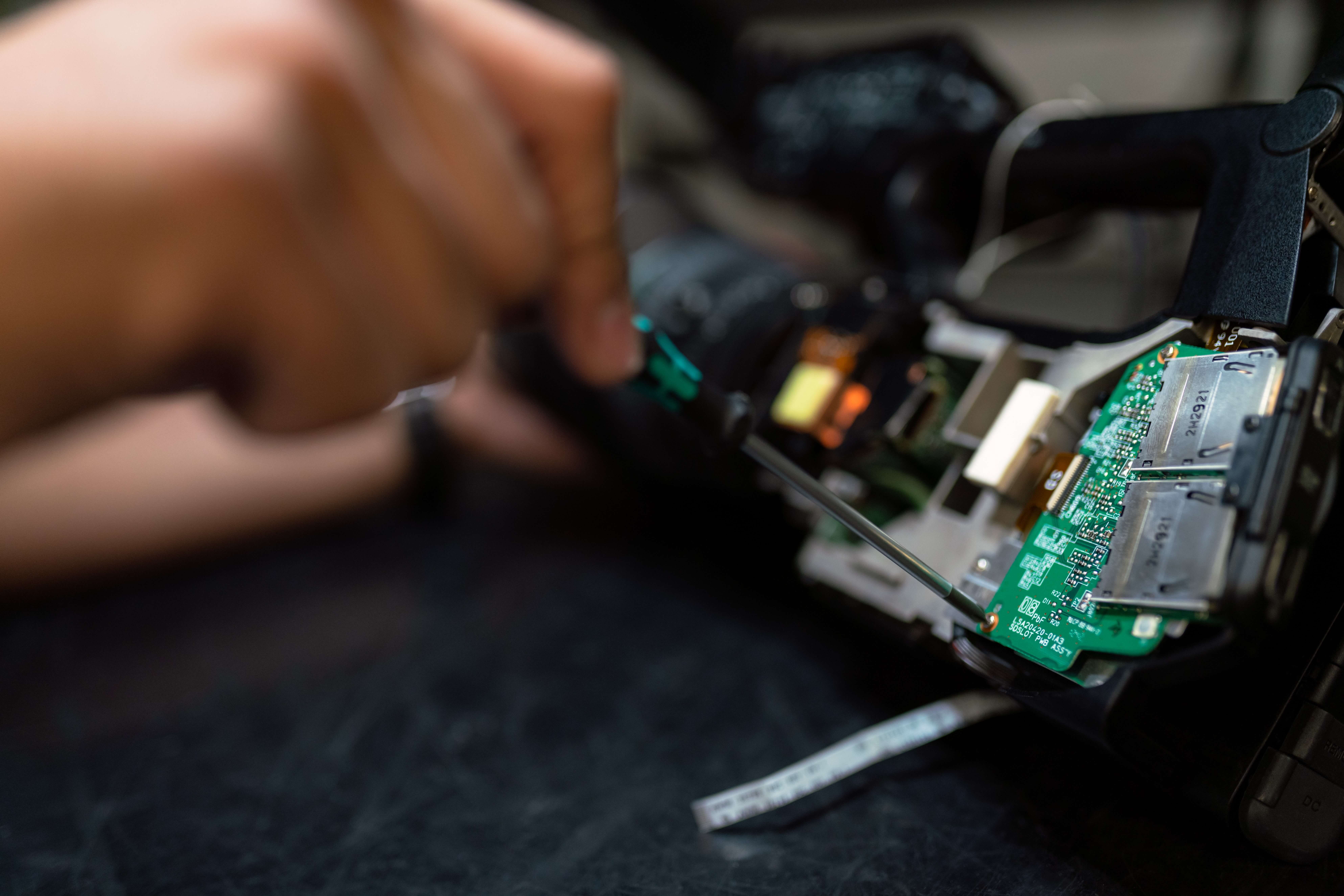 engineer working on circuit board.